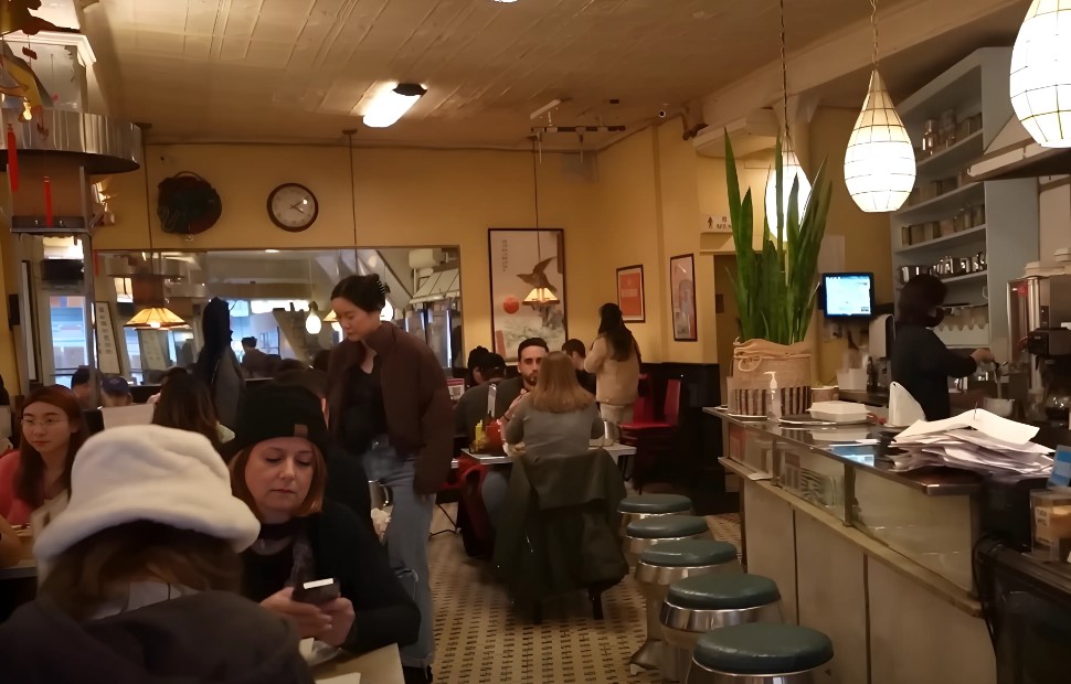 Restaurant in Brooklyn full of people eating