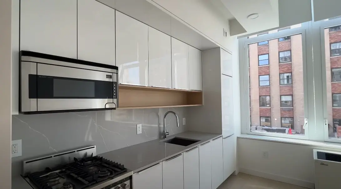 Modern kitchen with sleek white cabinetry