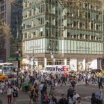 A bustling New York City street scene, showcasing the vibrant energy of the city